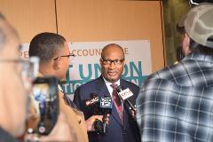 NBC President Dr. Jerry Young speaks to news media